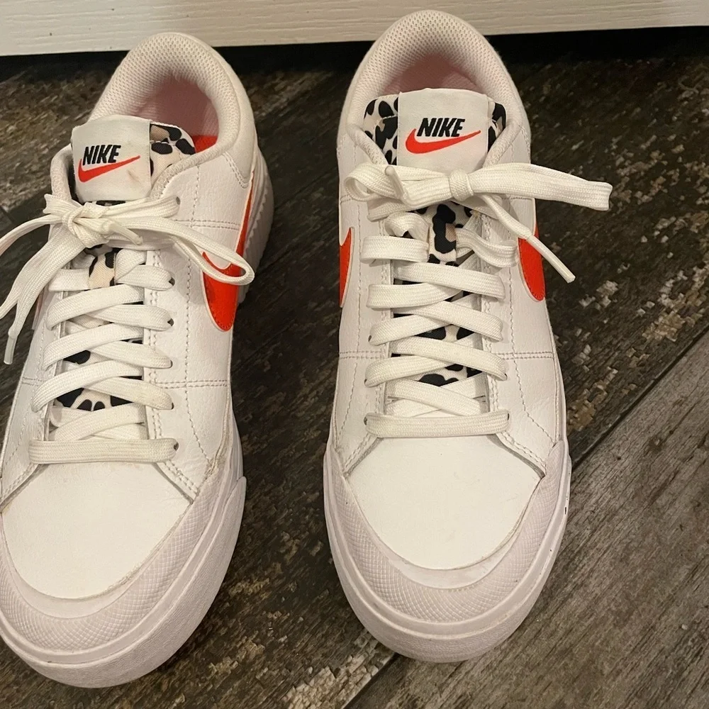 Women’s White and Orange Leopard Nikes sz 7.5 EUC